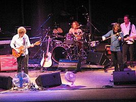 The Waterboys performing in Antwerp in 2003. L–R: Mike Scott, Geoff Dugmore, Steve Wickham and Brad Waissman.