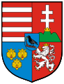 I. (Hunyadi) Mátyás címere, benne bal felül az Árpád-sávok, jobb felül Magyarország, bal alul Dalmácia, jobb alul Csehország, középen a Hunyadi-ház címere