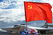 The Soviet flag along with an assortment of Russian and Soviet military flags