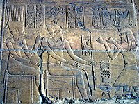 Relief depicting the Kushite king Arkamani presenting an offering to the gods