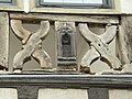 Two curved saltires also called St. Andrews crosses during repairs to a building in Germany: The infill has been removed.