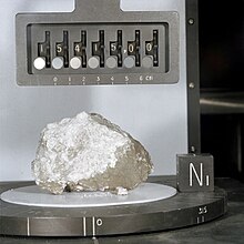 A white rock, placed in a laboratory setting