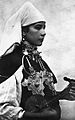 Image 6A Berber musician wearing two large triangular brooches in southern Morocco at the beginning of the 20th century (from Culture of Morocco)