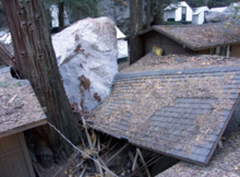 A photo showing cabin damage in Curry Village after the 2008 rockfall.