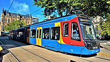 A Sheffield Supertram in current blue, orange and red Stagecoach livery.