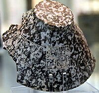 Fragment of a stone bowl with an inscription of Naram-Sin, and a second inscription by Shulgi (upside down). Ur, Iraq. British Museum.[54][55]