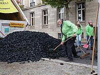 Protest with coal in front of the German Chancellery, 2017