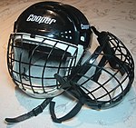 Black-coloured helmet with a metal mesh face shield