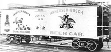 Photograph of an early refrigerated railroad car with Anheuser-Busch beer advertisements