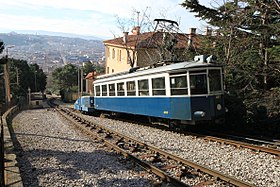 Opicina Tramway, on the cable-hauled section. The city of Trieste can be seen in the background.