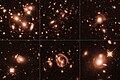 The lensing phenomenon allows for features as small as about 100 light-years or less.[56]