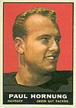 A color photo of a smiling Paul Hornung, with the text "Paul Hornung, Halfback, Green Bay Packers" in a black bar below the photo