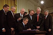 George W. Bush signing the Patriot Act into law