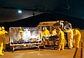 Медики транспортують пацієнта в біоконтейнері в місті Червія