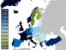 A map of Europe with countries labelled in shades of blue, green, and yellow based on when they joined NATO.