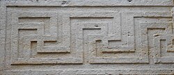 Because the outer lines point counterclockwise instead of the swastika's clockwise-pointing ends, this is referred to as a sauwastika. This pattern can be found in a Venetian palace that likely follows a Roman pattern, at Palazzo Roncale, Rovigo