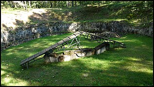 Pit used to burn corpses that were exhumed to destroy evidence of mass murders.