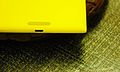 Detailed view of the Nokia Lumia 1520's speaker grille and micro USB port.