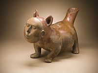 Dog with Human Mask, Mexico, Colima, slip-painted ceramic sculpture, 200 BC–AD 500