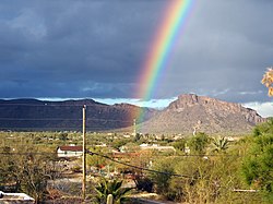 A rainbow appearing after a monsoon in Drexel Heights, Arizona, USA.