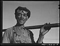 Chicago, Illinois. Frank Williams, working on the car repair tracks at an Illinois Central Railroad yard. Mr. Williams came to Chicago from Pocahontas, Mississippi. He has eight children, two of whom are in the United States Army.