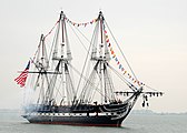 USS Constitution fires a 21-gun salute toward Fort Independence on Castle Island in celebration of the 213th anniversary of her launching, October 21, 2010.