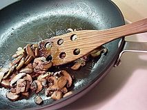 Sautéed mushrooms: baby Bella (portobello) mushrooms being sautéed