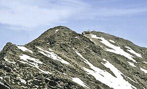 The Pico del Cervunal (foreground) and the Pico del Lobo (background) in El Cardoso de la Sierra. The Pico del Lobo stands as the tallest summit in the region at 2,273 metres above mean sea level.[10]