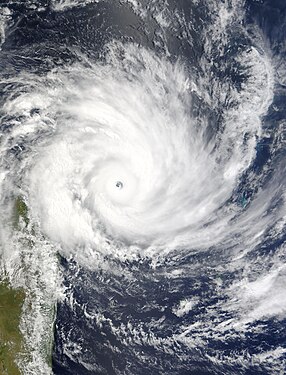 Satellite image of Cyclone Gafilo, a powerful Category 5 tropical cyclone which struck Madagascar in March 2004, causing devastating damage. This was taken just before landfall, when the system was at its peak intensity about 333 km (207 mi) east of Madagascar, with sustained windspeed of 260 km/h (160 mph). At least 250 people were listed dead, with more missing, and 300,000 people were left homeless due to Gafilo. (Credit: Terra satellite, NASA.)