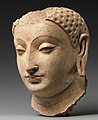 Head of Buddha, from Hadda, Afghanistan, ca. 5th–6th century. Metropolitan Museum of Art.[422]
