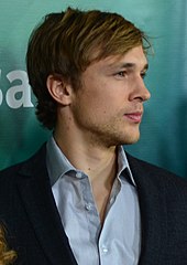 William Moseley looking away from the camera