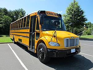 In North America, school buses such as this one in Albemarle County, Virginia are required to be painted yellow.