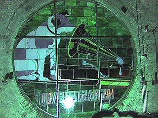 One of 4 Nipper stained glass windows seen from inside the "Nipper Tower" in the old RCA Victor Building 17.[71]