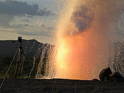 A large orange-yellow explosion