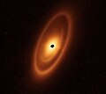 Image 18Astronomers used the James Webb Space Telescope to image the warm dust around a nearby young star, Fomalhaut, in order to study the first asteroid belt ever seen outside of the Solar System in infrared light. (from Cosmic dust)