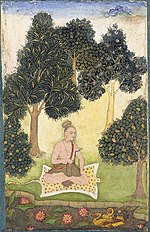 A yogi seated in a garden.jpg