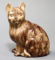 Cat, c. 1750, "Whieldon-type" in tortoiseshell ware