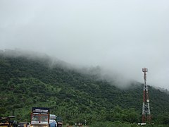 Fog partially obscuring a mountain in Tirupati in the India summer.
