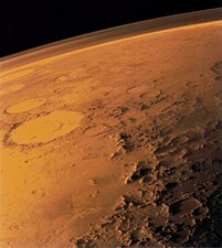 Mars appears to be red because of iron oxide on its surface.