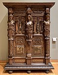 Cupboard; c. 1580; walnut and oak, partially gilded and painted; height: 2.06 m, width: 1.50 m; Louvre[153]