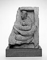 5th century A.D. sculpture from the Gupta Empire, India, showing a lady playing an arched harp.