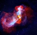 Холодна речовина, що падає на М87 зі скупчення Діви й зустрічається з релятивістських струменем, утворюючи в міжзоряному просторі ударну хвилю. Фото з рентгенівського телескопа Чандра
