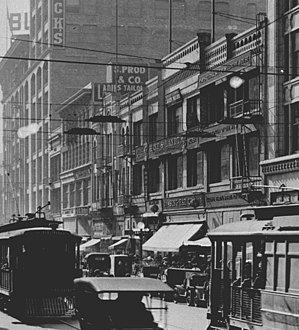 W. side of mid-600 block, Broadway, c.1915. Bullock's at left (NE corner of 7th). Central Dept. Store Bldg. (#609–619) at right