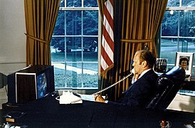 U.S. President Gerald Ford speaks to the Soviet and American crews on 18 July 1975.