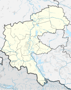 Mapa konturowa powiatu raciborskiego, blisko centrum na lewo znajduje się punkt z opisem „Głaz narzutowy na placu Wolności”