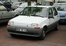 A white Renault car in a car park