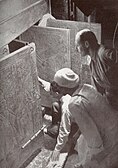 Carter and colleagues looking into the opened shrines within the tomb