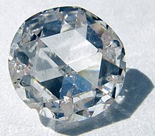 A colorless faceted gem