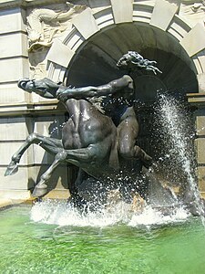 Triton on the north side of the fountain
