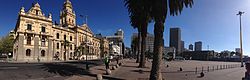 A panoramic photograph of the old Cape Town City Hall and Grand Parade.